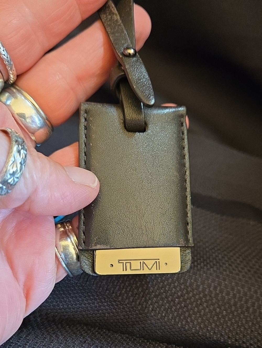 Tumi Dark Brown Leather Luggage Tag with Gunmetal Logo Plate